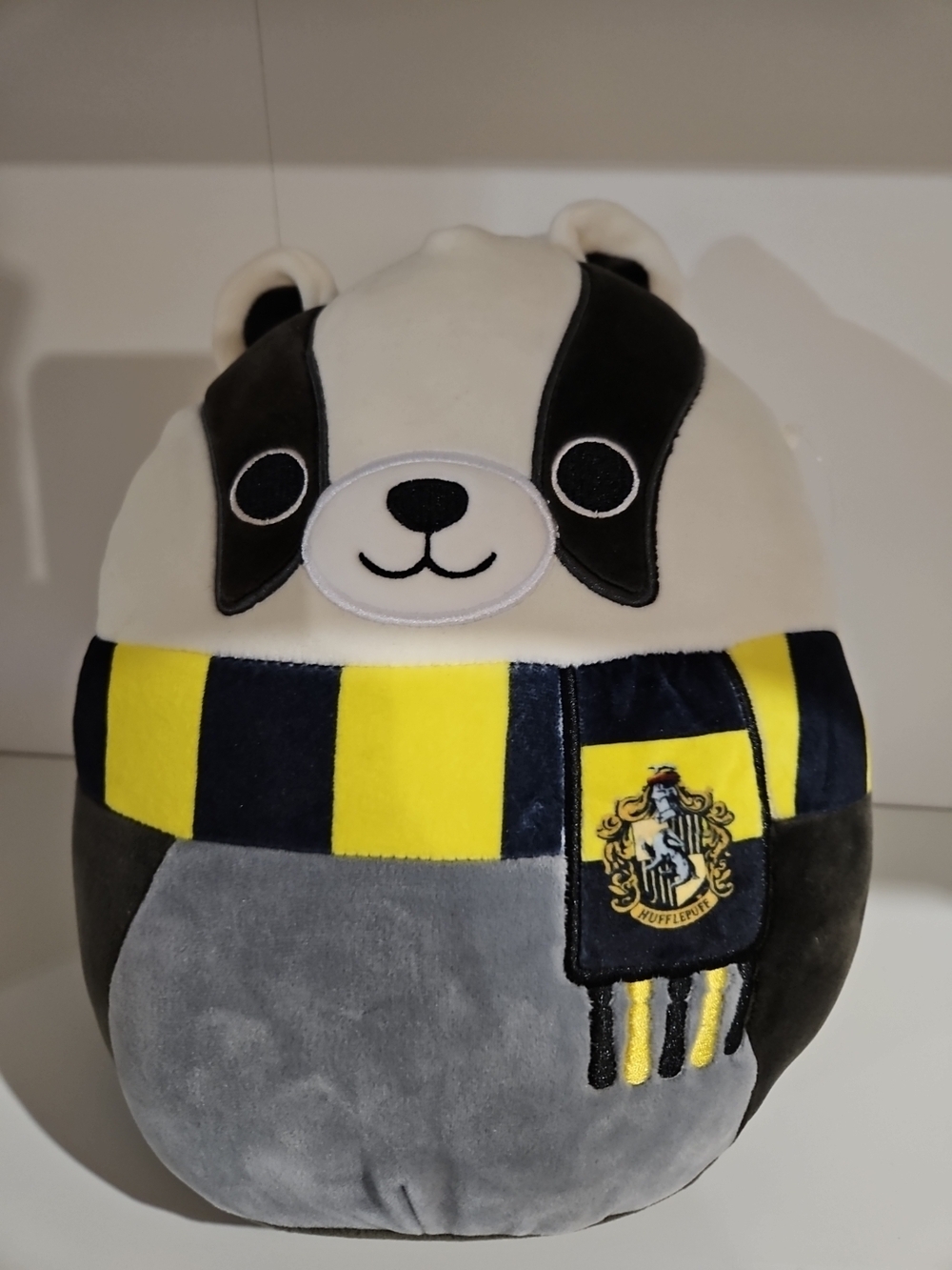 Squishmallows Hufflepuff Badger Plush in Yellow, Black, Gray, White